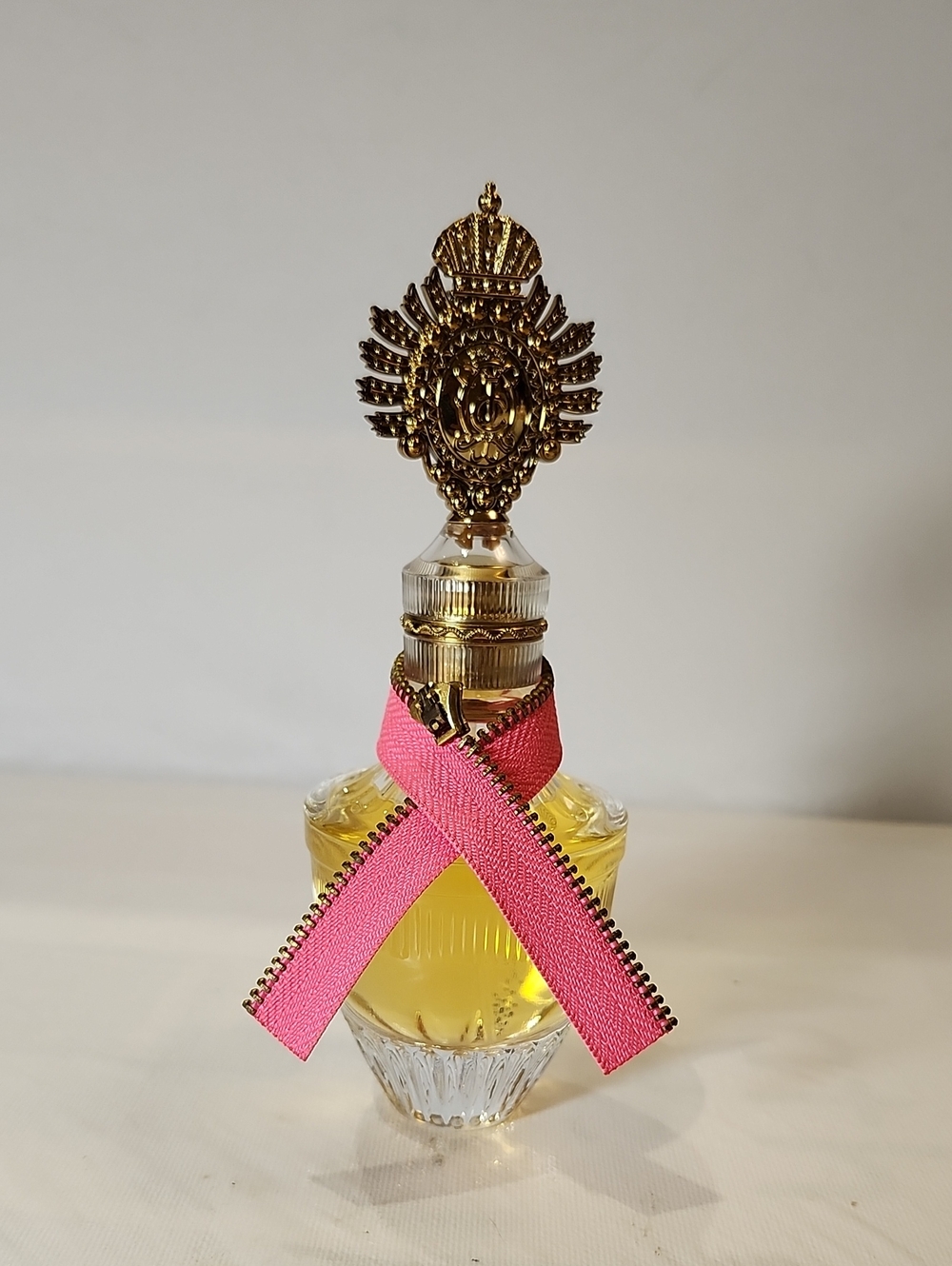 Juicy Couture EDP Spray  Perfume Bottle with Pink Ribbon 1.7 Fl Oz 50ml
